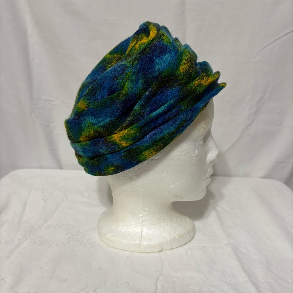 Frank M. Benson fuzzy cap hat in a multi-color design of blues and greens. - Picture 4 of 6